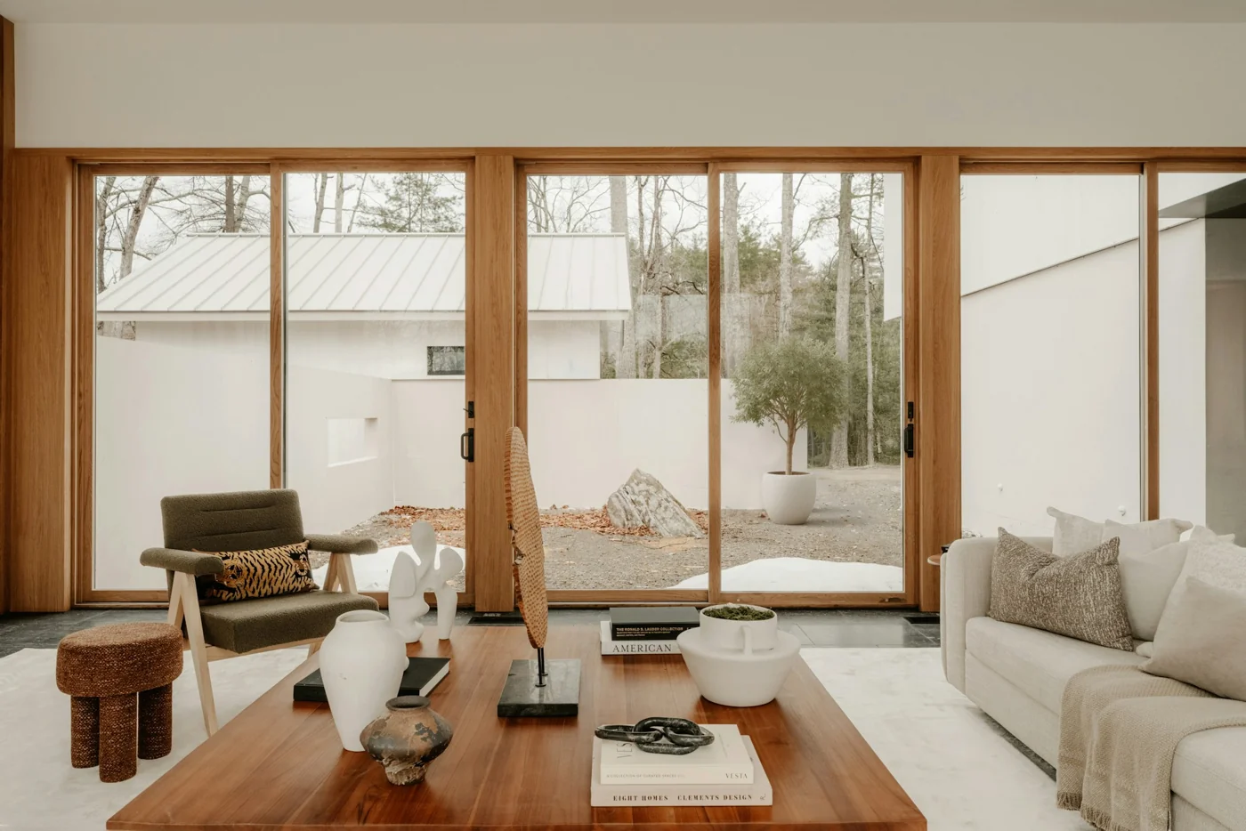 Natural light, warm timber and a view into a quiet courtyard